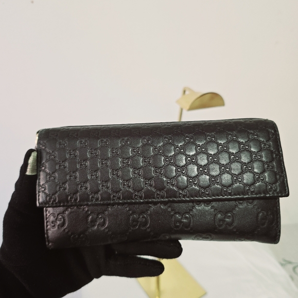 Gucci Handbags - Gucci GUCCISSIMA Black Embossed Leather Wallet